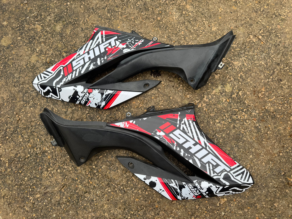 Caches latéraux avant Yamaha 125 WRX